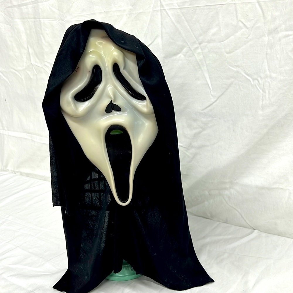Scream Mask Easter Unlimited LLC glow in the dark mask with shrouds on side